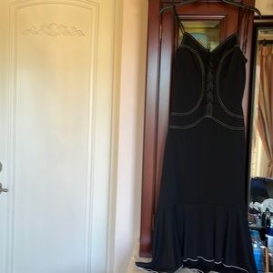 Black strapped dress with stitching design and high-low bottom